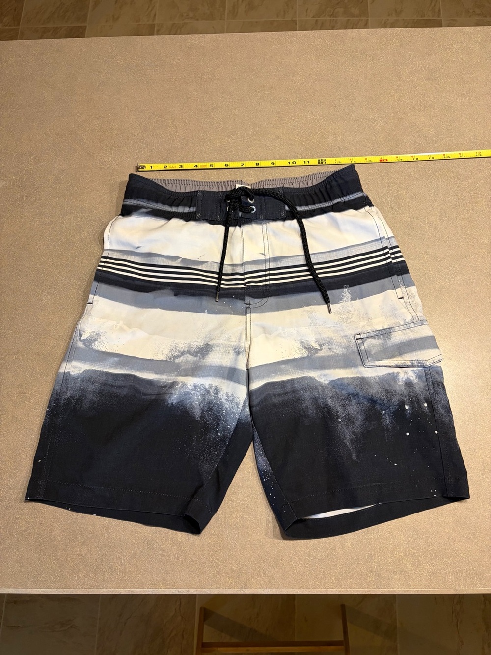 Sonoma size small men’s swim trunks with the mesh/net lining inside and pockets